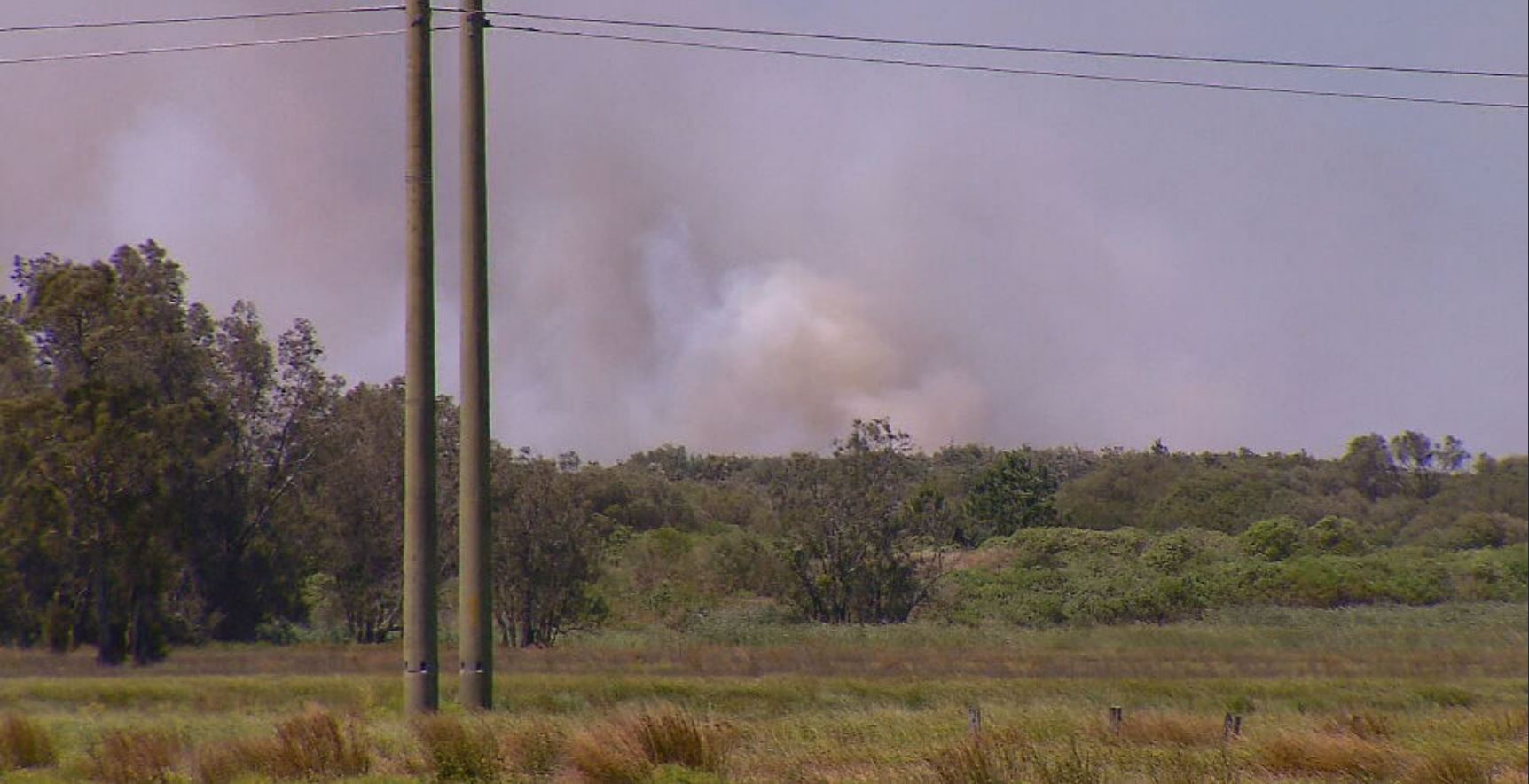 Firefighters warn of bushfire threat as blaze continues to burn at Port Stephens